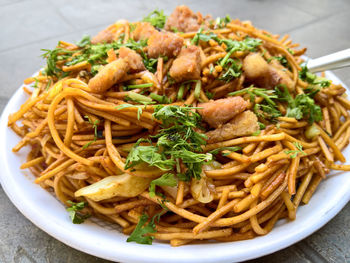 High angle view of spaghetti in plate on table