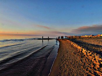 Scenic view of sea at sunset
