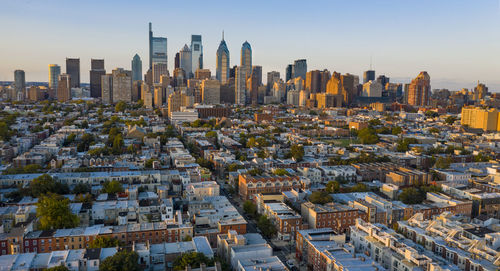 Aerial view of modern buildings against sky in city