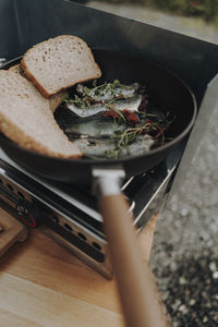 High angle view of person preparing food