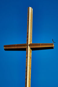 Low angle view of built structure against blue sky