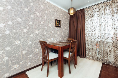 Wooden table and chairs in the kitchen