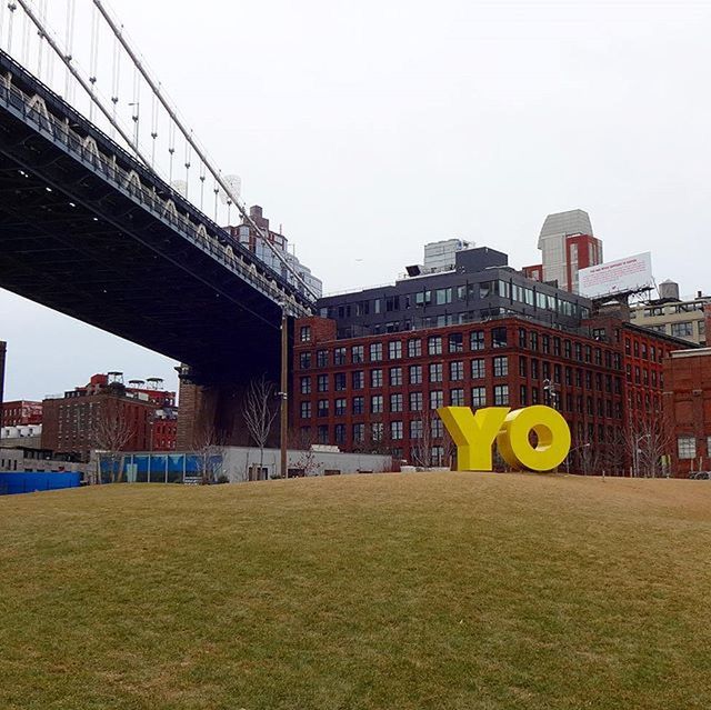 architecture, built structure, building exterior, clear sky, bridge - man made structure, connection, city, copy space, transportation, engineering, outdoors, day, bridge, river, no people, building, sky, railing, city life, residential building