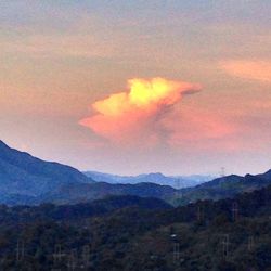 Scenic view of mountains against sky during sunset