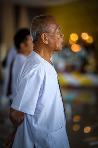 Side view of senior man looking away 