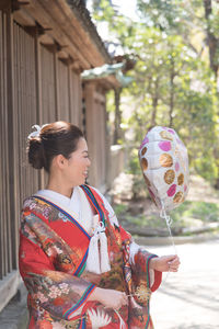 Woman holding umbrella