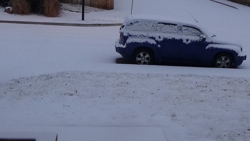 Close-up of car on snow