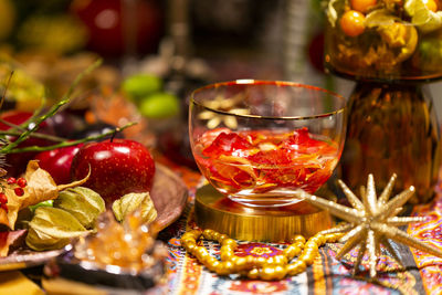 Close-up of fruits in glass on table