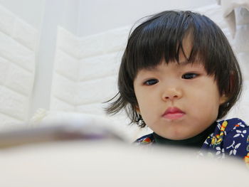 Portrait of cute boy at home