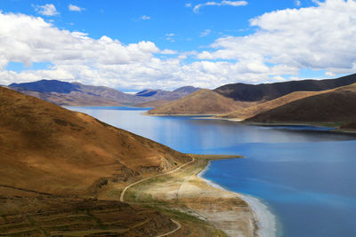 Calm lake along rocky landscape