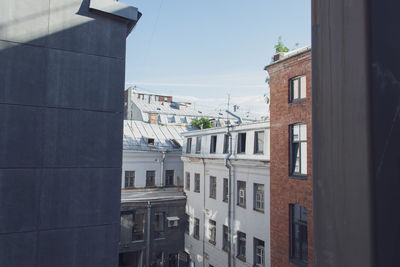 Buildings in city against sky