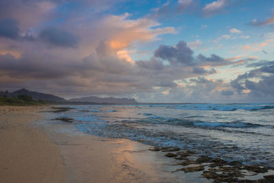 Scenic view of sea against sky during sunset