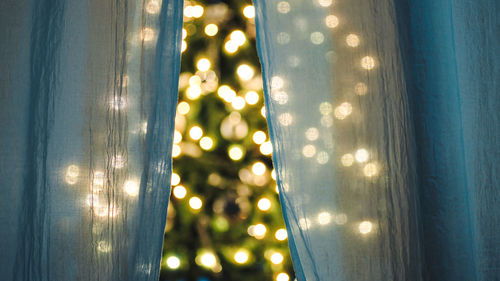 Close-up of illuminated light bulb
