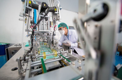 Portrait of worker working in factory