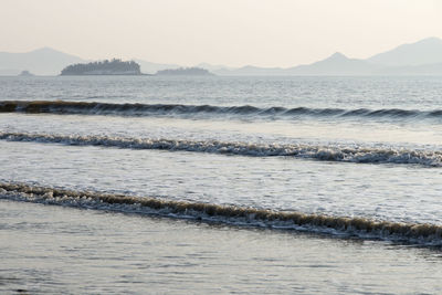 Scenic view of sea against clear sky