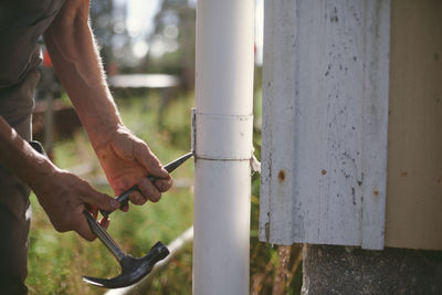 Man using hammer