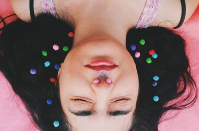 Directly above shot of woman with pom-pom