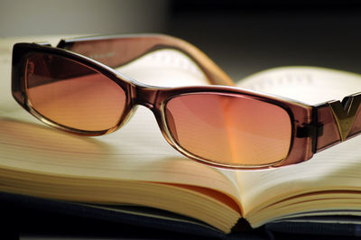 Close-up of sunglasses against black background