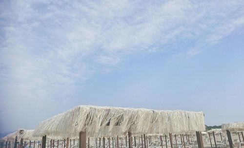 Low angle view of built structure against blue sky