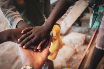 Midsection of people preparing food