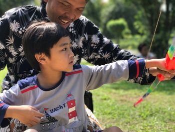 Boy shooting arrow