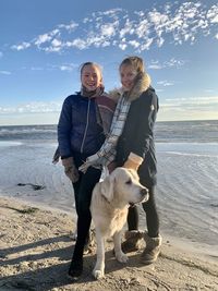 Man with dog on beach