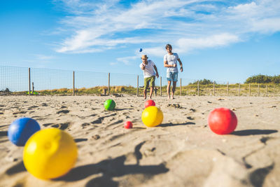 Tourists play