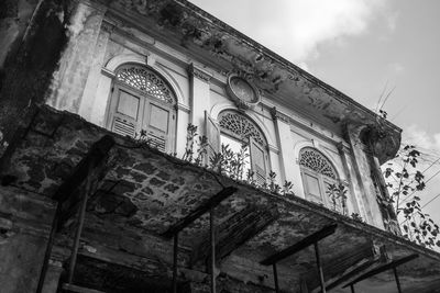 Low angle view of old building against sky