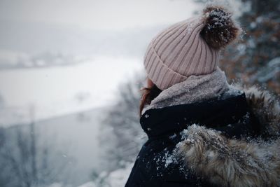 Portrait of person wearing hat during winter