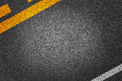 Full frame shot of zebra crossing on road