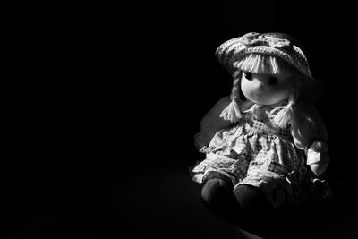 Close-up of toy against black background