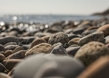 Close-up of stones on beach