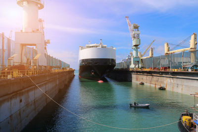 View of commercial dock against sky