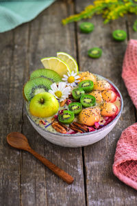 High angle view of fruits in bowl on table