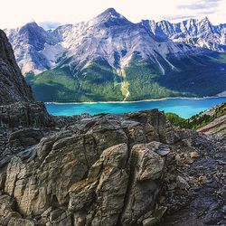 Scenic view of lake with mountains in background