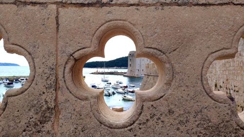 View of buildings seen through arch