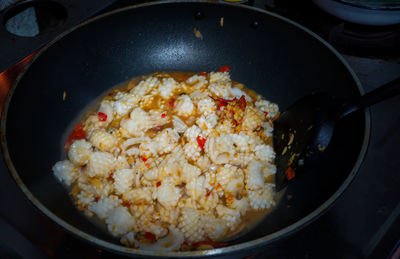 High angle view of meat in cooking pan