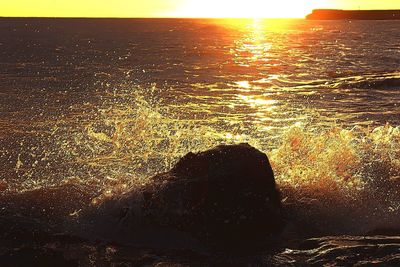 Close-up of silhouette man against sky during sunset