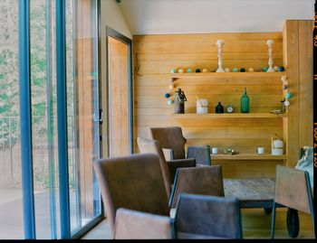 Empty chairs and tables in cafe