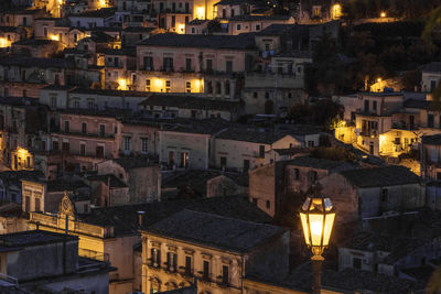 High angle view of illuminated buildings at night