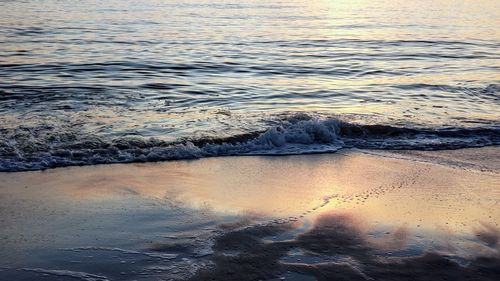 High angle view of sea shore during sunset