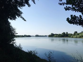 Scenic view of lake against clear sky