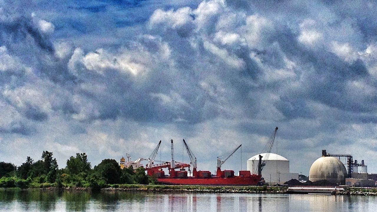 nautical vessel, water, sky, transportation, mode of transport, cloud - sky, boat, moored, harbor, cloudy, waterfront, mast, cloud, lake, commercial dock, nature, ship, outdoors, river, no people