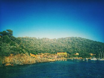 Scenic view of calm sea against clear sky