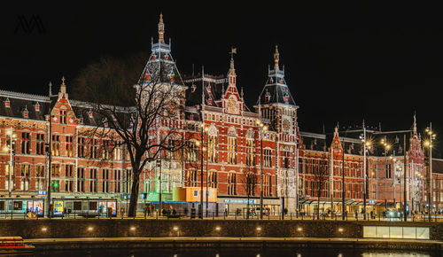 Illuminated buildings in city at night