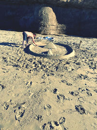 High angle view of toy on sand at beach