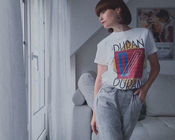 Full length of boy standing at home