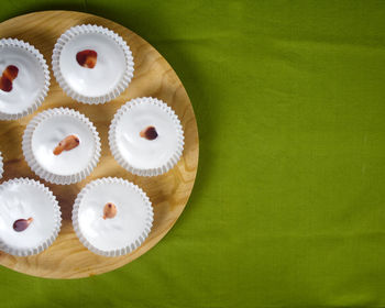 High angle view of cupcakes on table