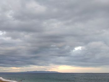 Scenic view of sea against dramatic sky
