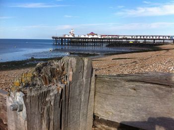 Pier over sea against sky